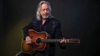 Jim Lauderdale with Coco, the 1994 Collings D2H A that is his number one. 
