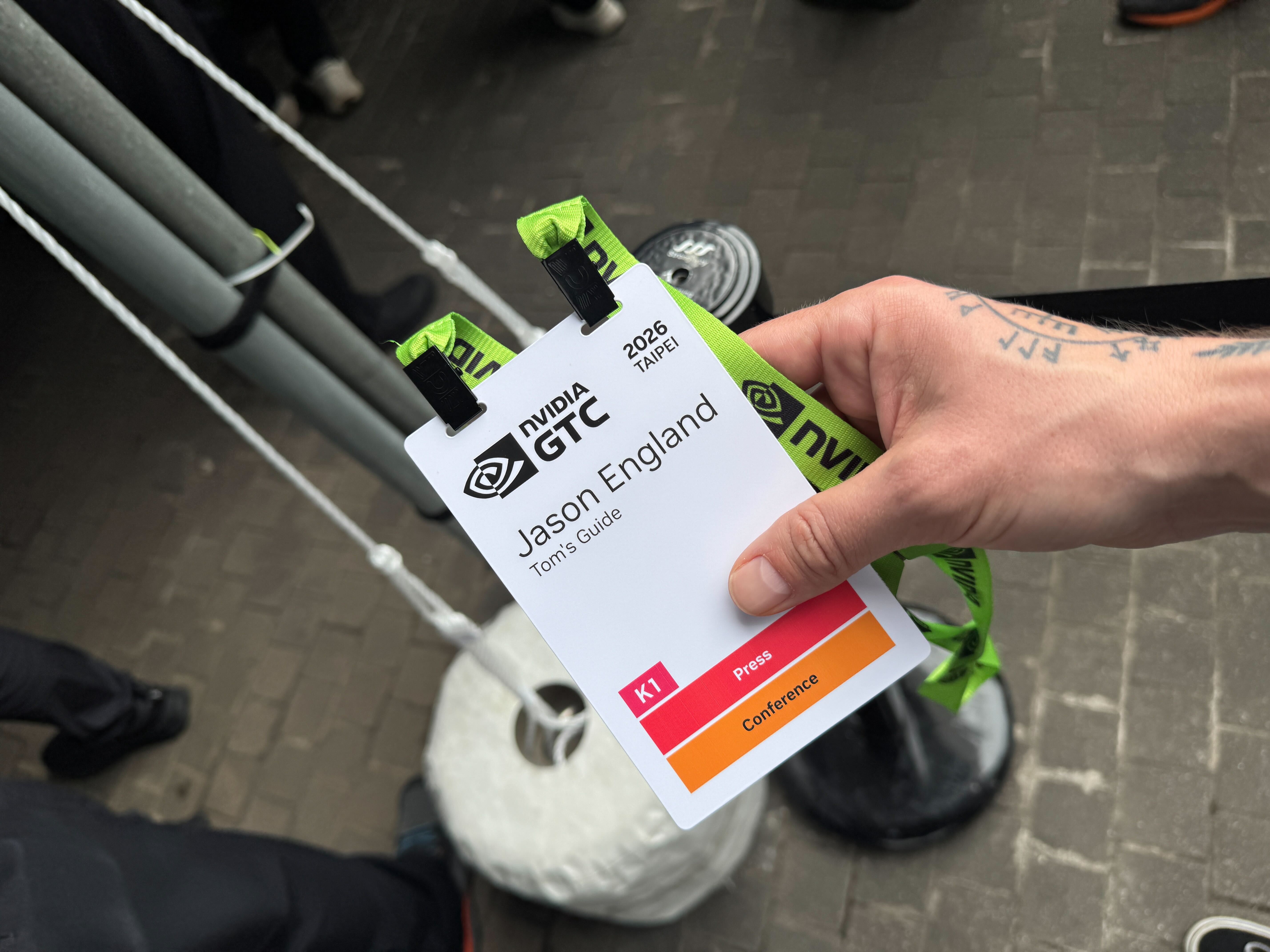Jason holding his Nvidia Computex 2026 keynote badge