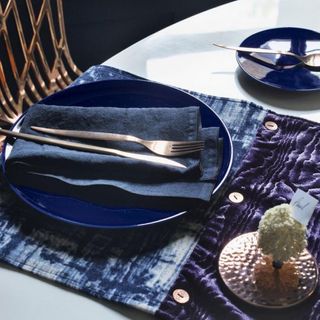 dining table with dinner plate with fork
