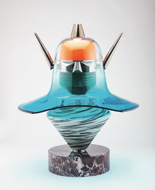 Three figurines made of glass and inspired by Goldrake characters