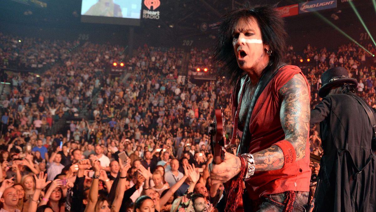 Nikki Sixx of the band Motley Crue performs onstage during the 2014 iHeartRadio Music Festival at the MGM Grand Garden Arena on September 19, 2014 in Las Vegas, Nevada.