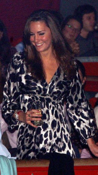 Kate Middleton smiles as she attends the AFRIKA! AFRIKA! show at the O2 Arena on January 17, 2008