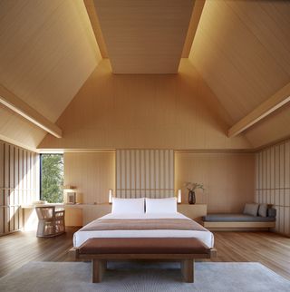 hotel guest bedroom with light brown and wooden decor