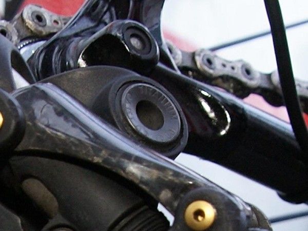 A titanium bolt mounts the new rear derailleur to the frame.