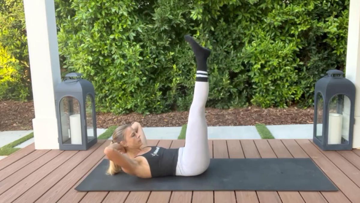 a photo of a woman doing a leg lower