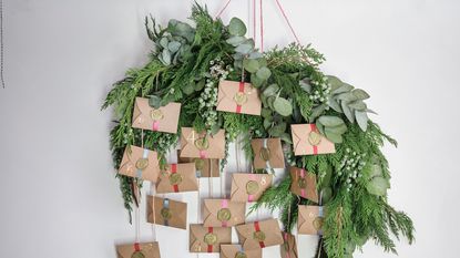 Green foliage and brown envelope advent calendar