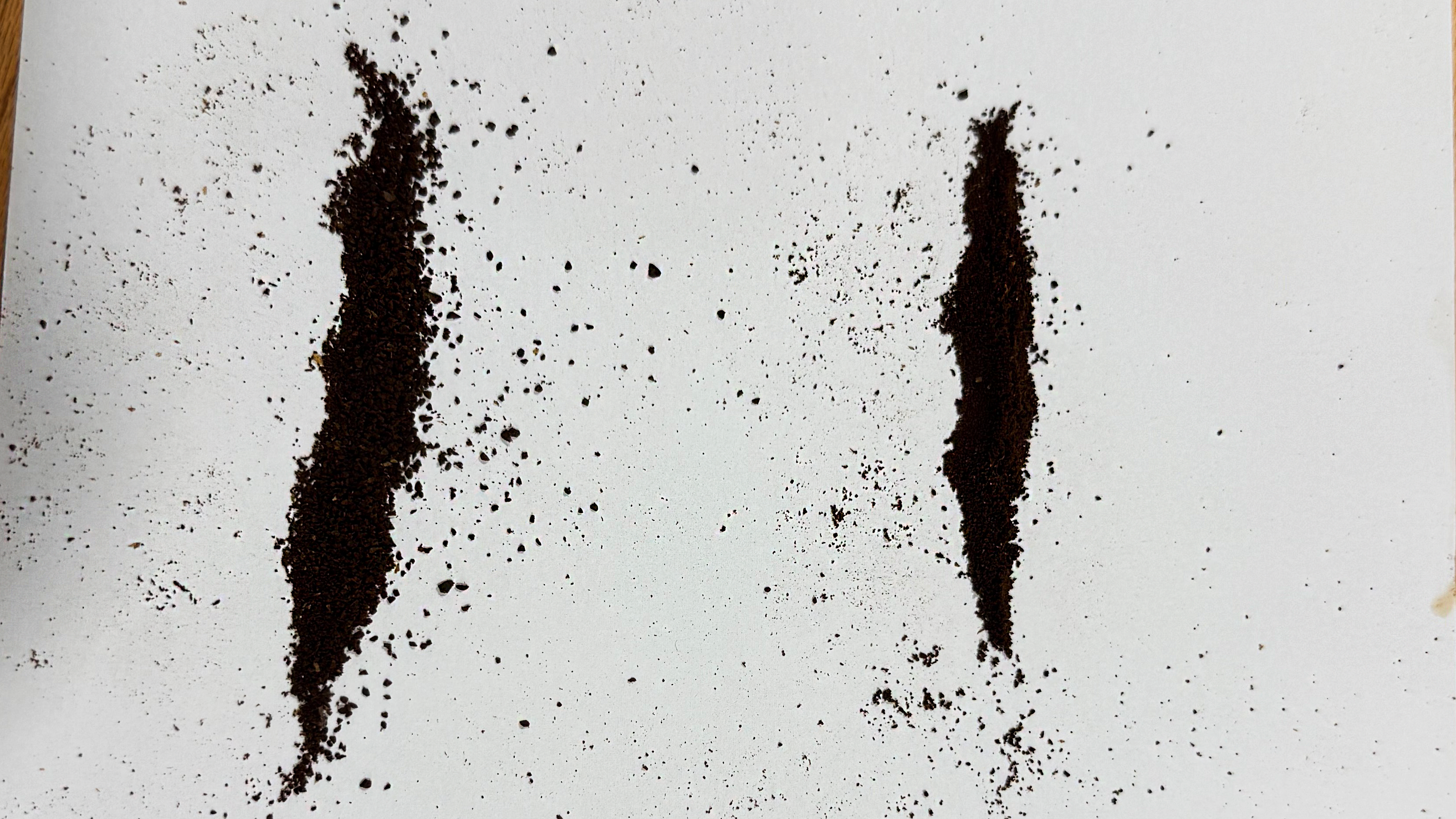 a photo of coffee ground on the gevi 10-cup drip coffee maker with grinder, showing the inconsistent grind size