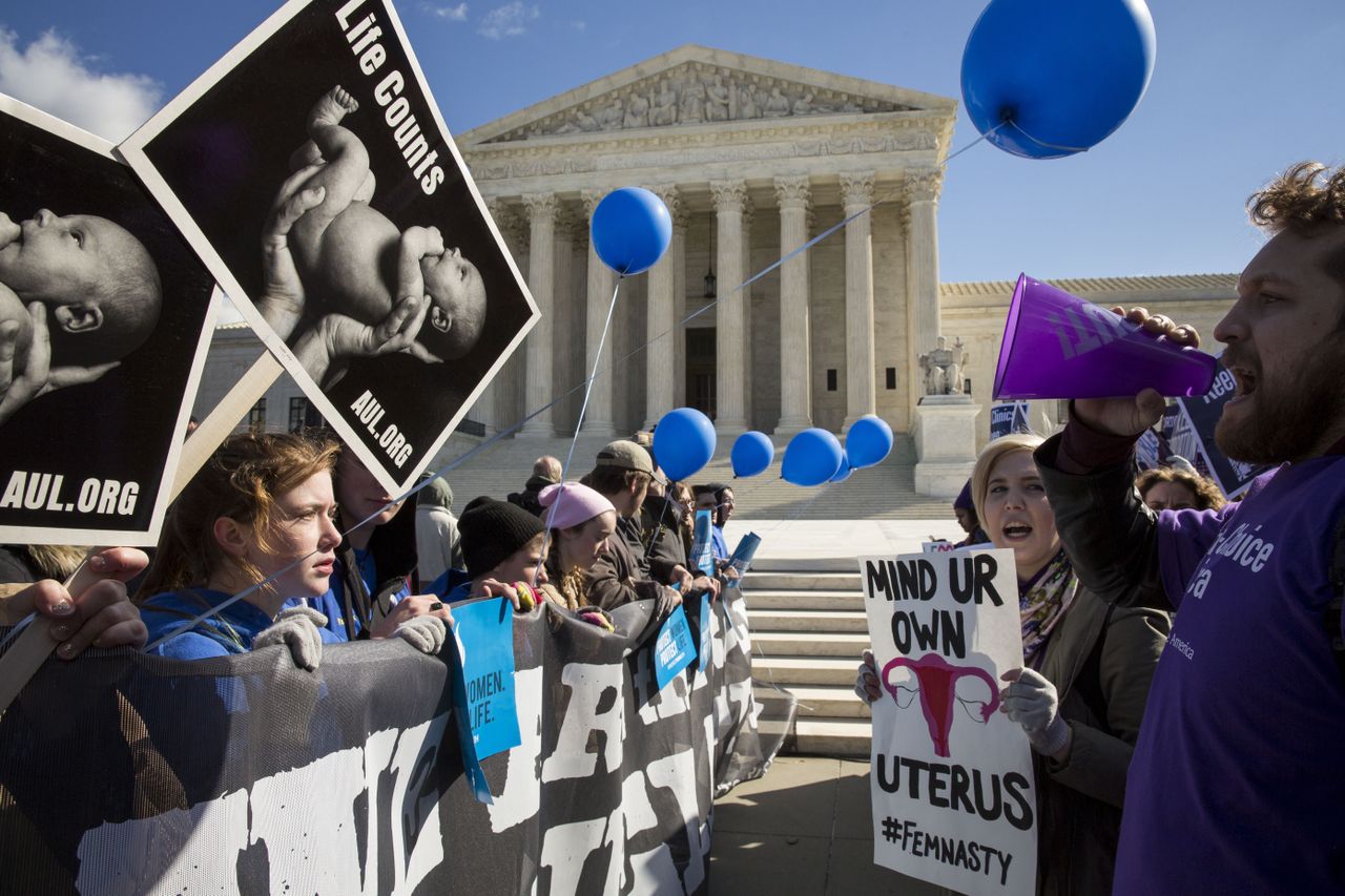 People for and against abortion protest on Capital Hill.