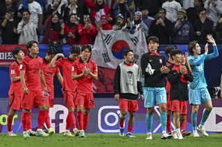South Korea players celebrate victory over Australia in the quarter-finals of the Asian Cup in 2023.