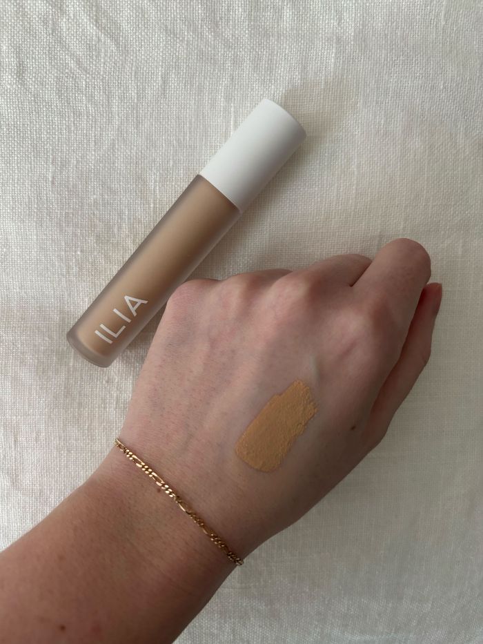 Deputy beauty editor Grace Lindsay testing an Ilia concealer on the back of her hand