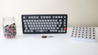 The IROK FE75Pro mechanical keyboard without keycaps or switches on a desk