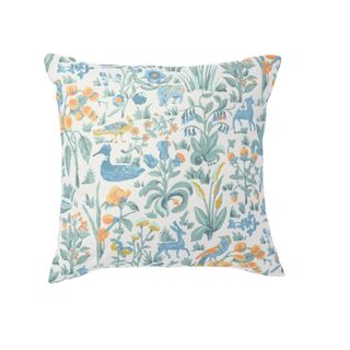 Blue throw pillow with woodland animal print