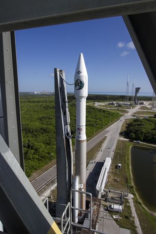 The United Launch Alliance Atlas V rocket carrying the classified NROL-61 satellite is rolled from the Vertical Integration Facility to the pad at Space Launch Complex-41 at the Cape Canaveral Air Force Station in Florida.