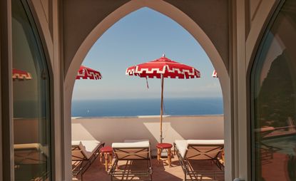 pool and red umbrella at Il Capri hotel