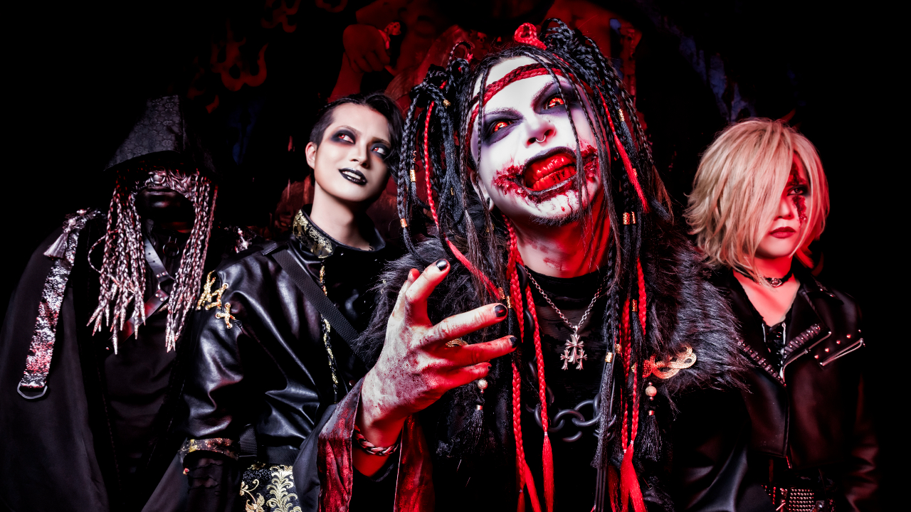 Deviloof in scary makeup looking at the camera