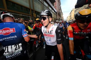 SANREMO ITALY MARCH 18 Tadej Pogacar of Slovenia and UAE Team Emirates R congratulate to Mathieu Van Der Poel of The Netherlands and Team AlpecinDeceuninck L at the finish line during the 114th MilanoSanremo 2023 a 294km one day race from Abbiategrasso to Sanremo MilanoSanremo UCIWT on March 18 2023 in Sanremo Italy Photo by Dario Belingheri PoolGetty Images