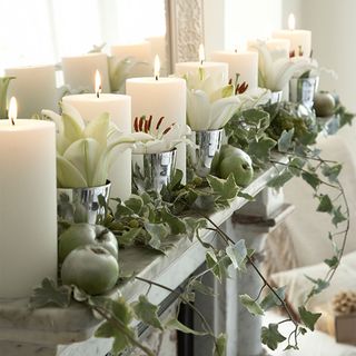 Christmas candle ideas with mantle and greenery