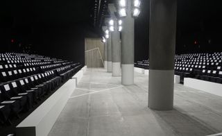 The Lincoln Centre theatre offered a raw setting with white marking lines leading models around giant concrete pillars