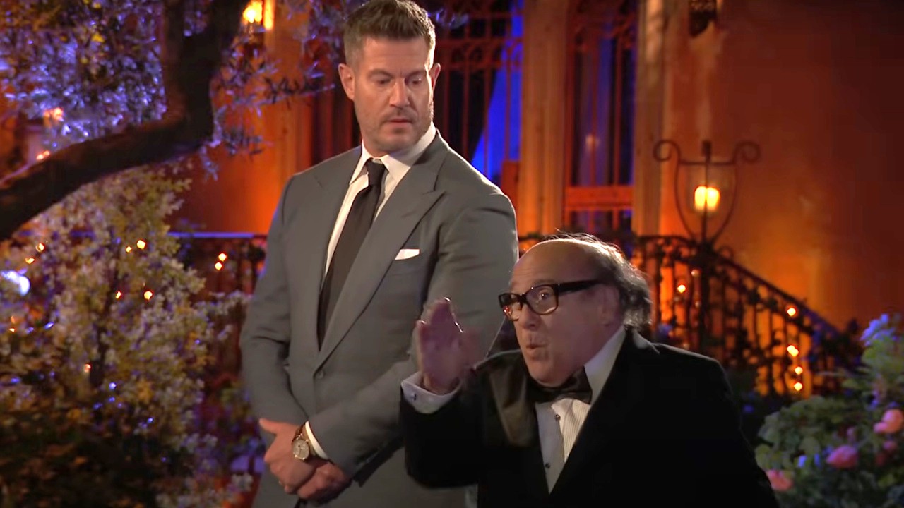 Jesse Palmer looks at Danny Devito&#039;s Frank Reynolds on It&#039;s Always Sunny in Philadelphia&#039;s Season 17 finale &quot;The Golden Bachelor Live.&quot;