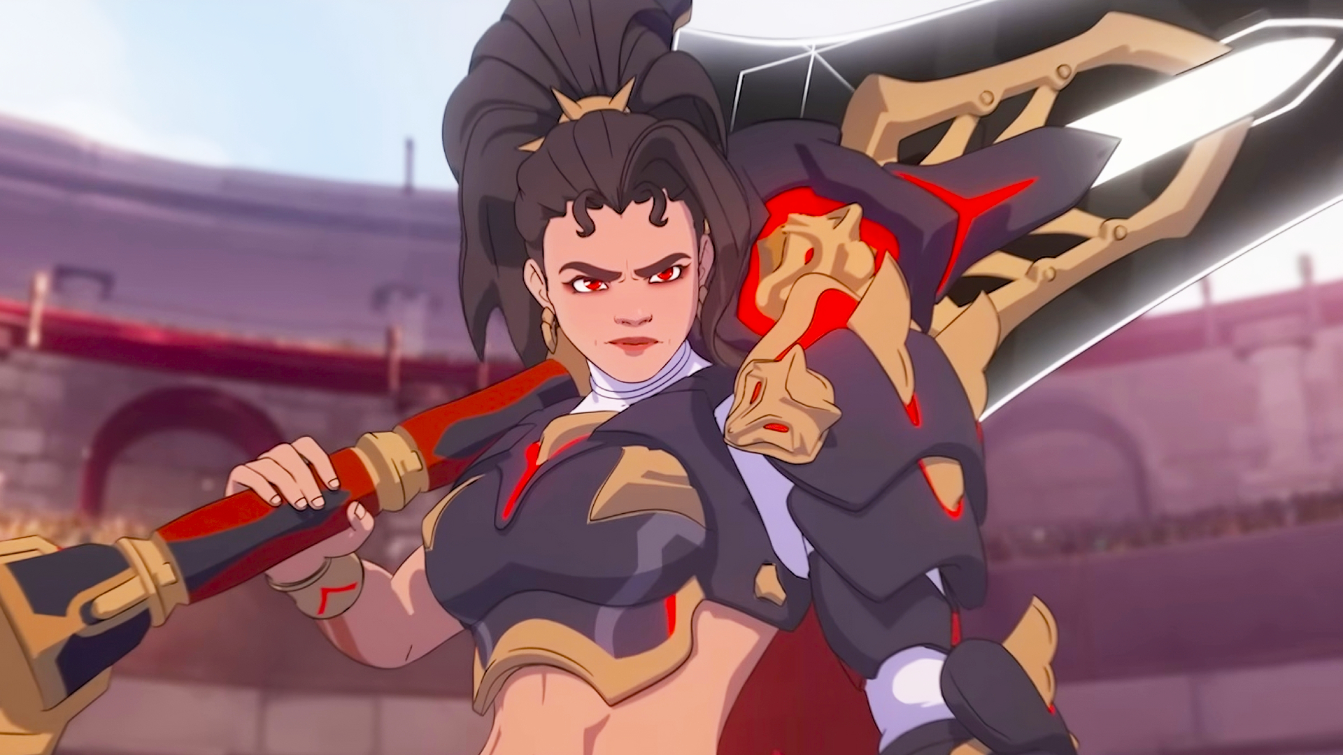 A screencap of Overwatch 2 hero Vendetta&#039;s debut trailer. A woman with brown hair holds a gigantic black sword over her shoulder. She is wearing black, red, and gold gladiator-themed armor with wolf insignias.