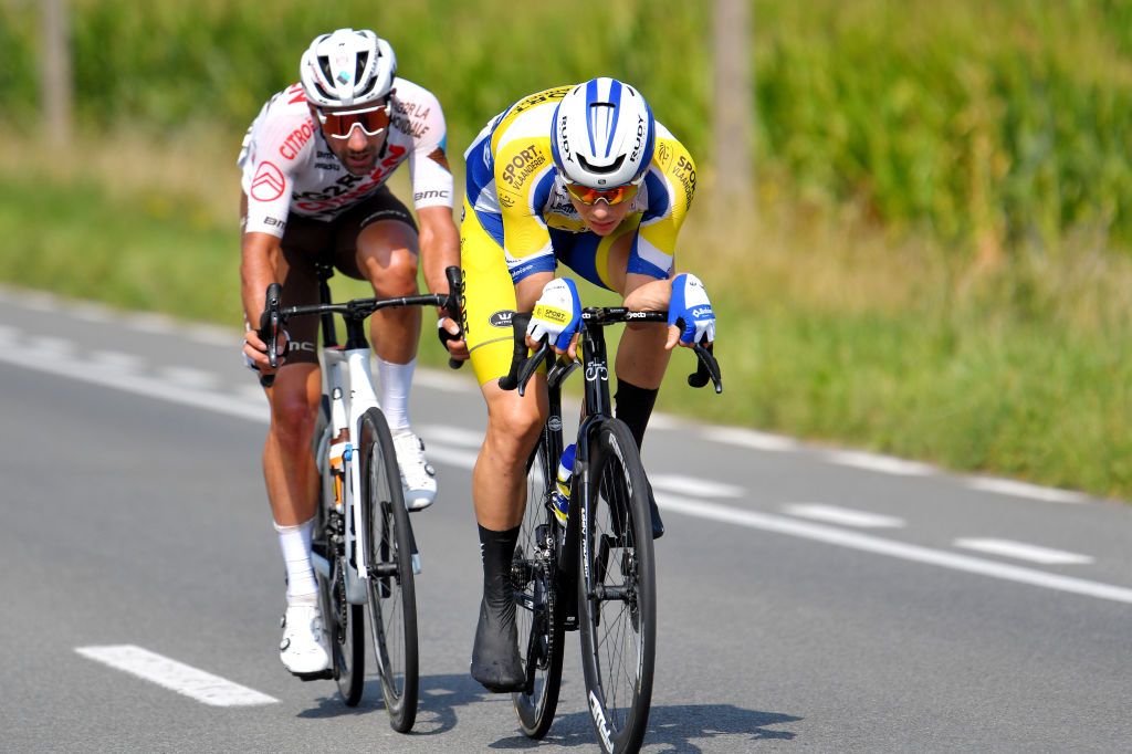 ARDOOIE BELGIUM SEPTEMBER 02 Julien Duval of France and AG2R Citren Team and Rune Herregodts of Belgium and Team Sport Vlaanderen Baloise compete in the breakaway during the 17th Benelux Tour 2021 Stage 4 a 1661km stage from Aalter to Ardooie BeneluxTour on September 02 2021 in Ardooie Belgium Photo by Luc ClaessenGetty Images