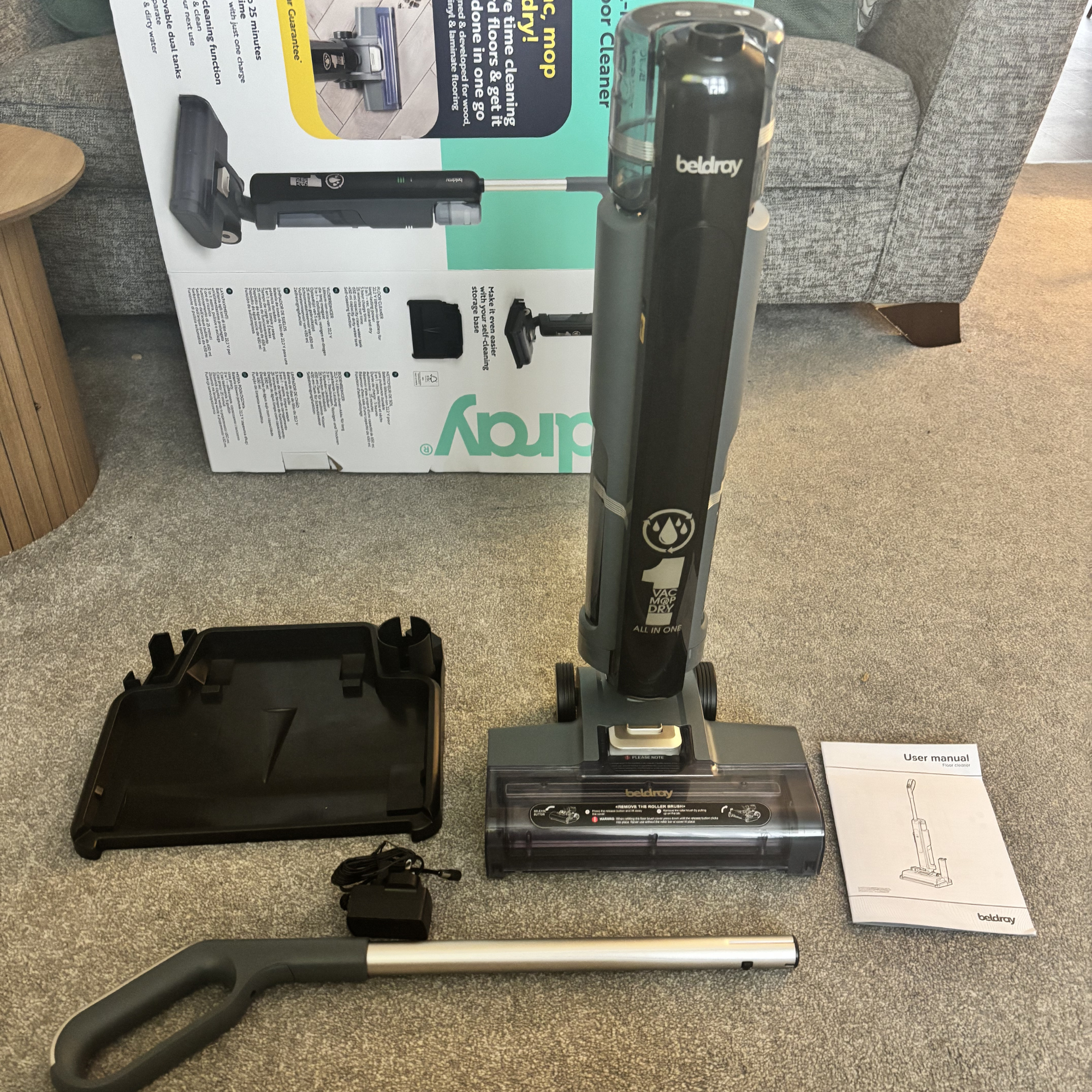 flatlay of All-in-One Multi-Surface Floor Cleaner parts and accessories 