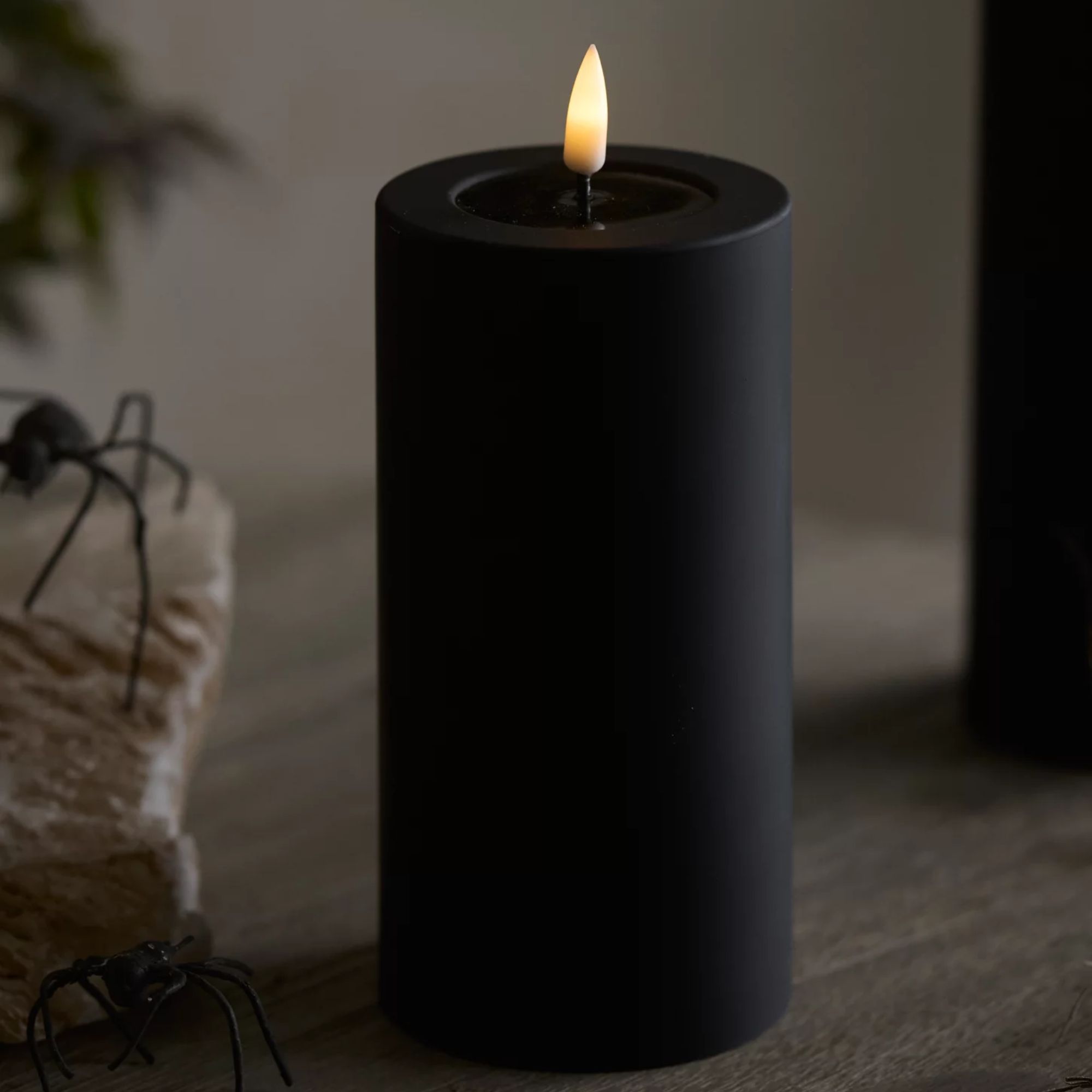 Black flameless pillar candle