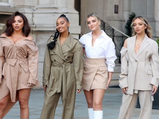 Little Mix pose in the street ahead of performance