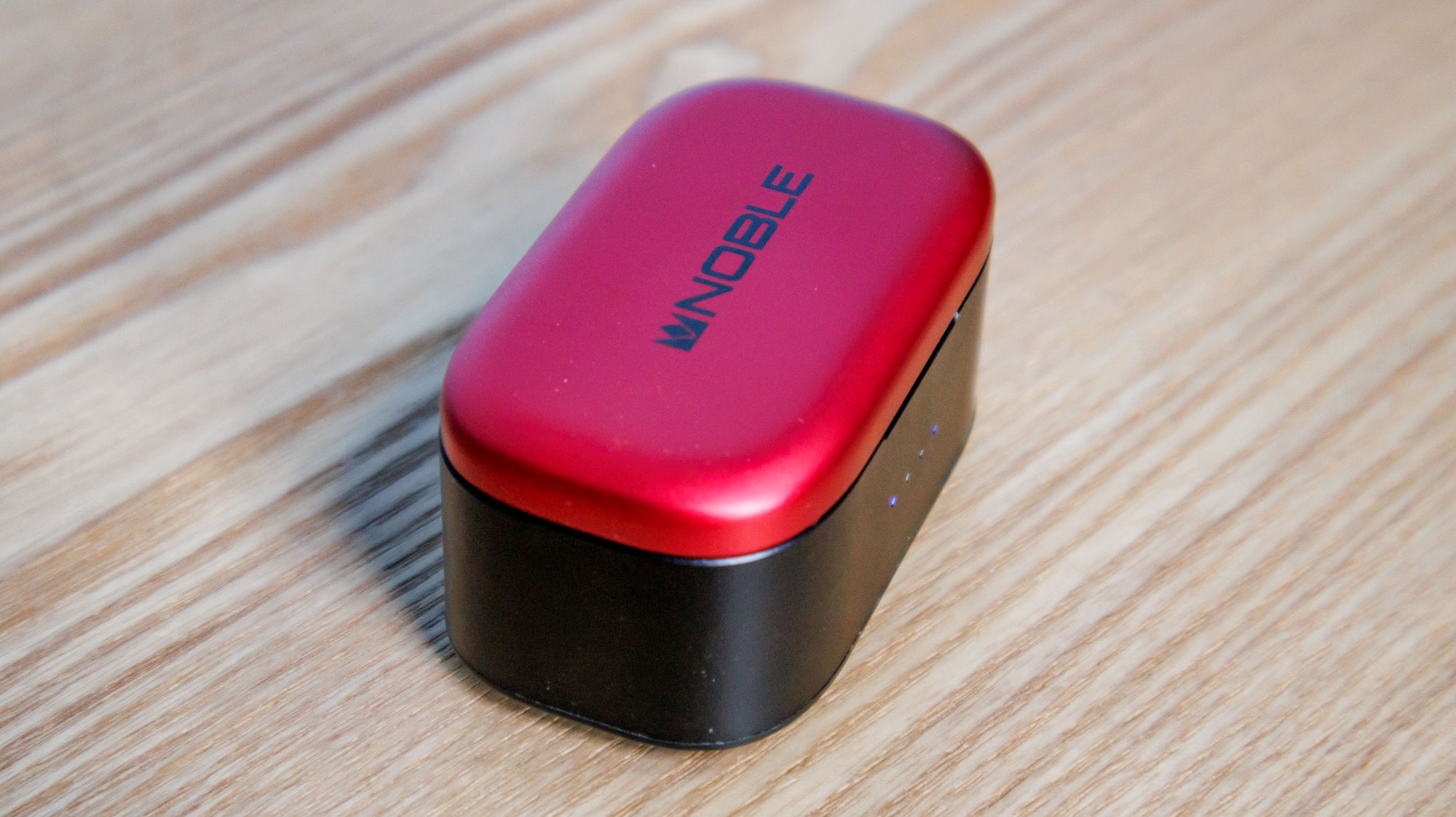 Noble Fokus Amadeus on a wooden surface, showing the top of the case