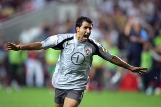 Ricardo celebrates after scoring his winning penalty for Portugal against England at Euro 2004.