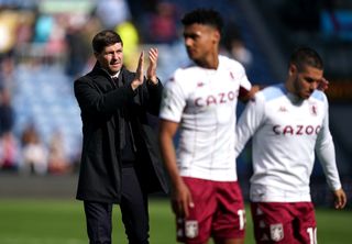 Steven Gerrard, left, applauds after the game