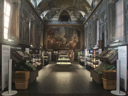 Supermarket inside frescoed palace in Milan