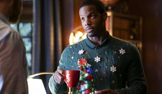 Dorian Williams in Christmas sweater Legacies Season 2