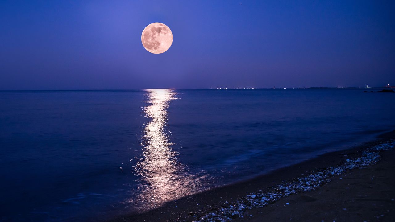 moon over ocean.