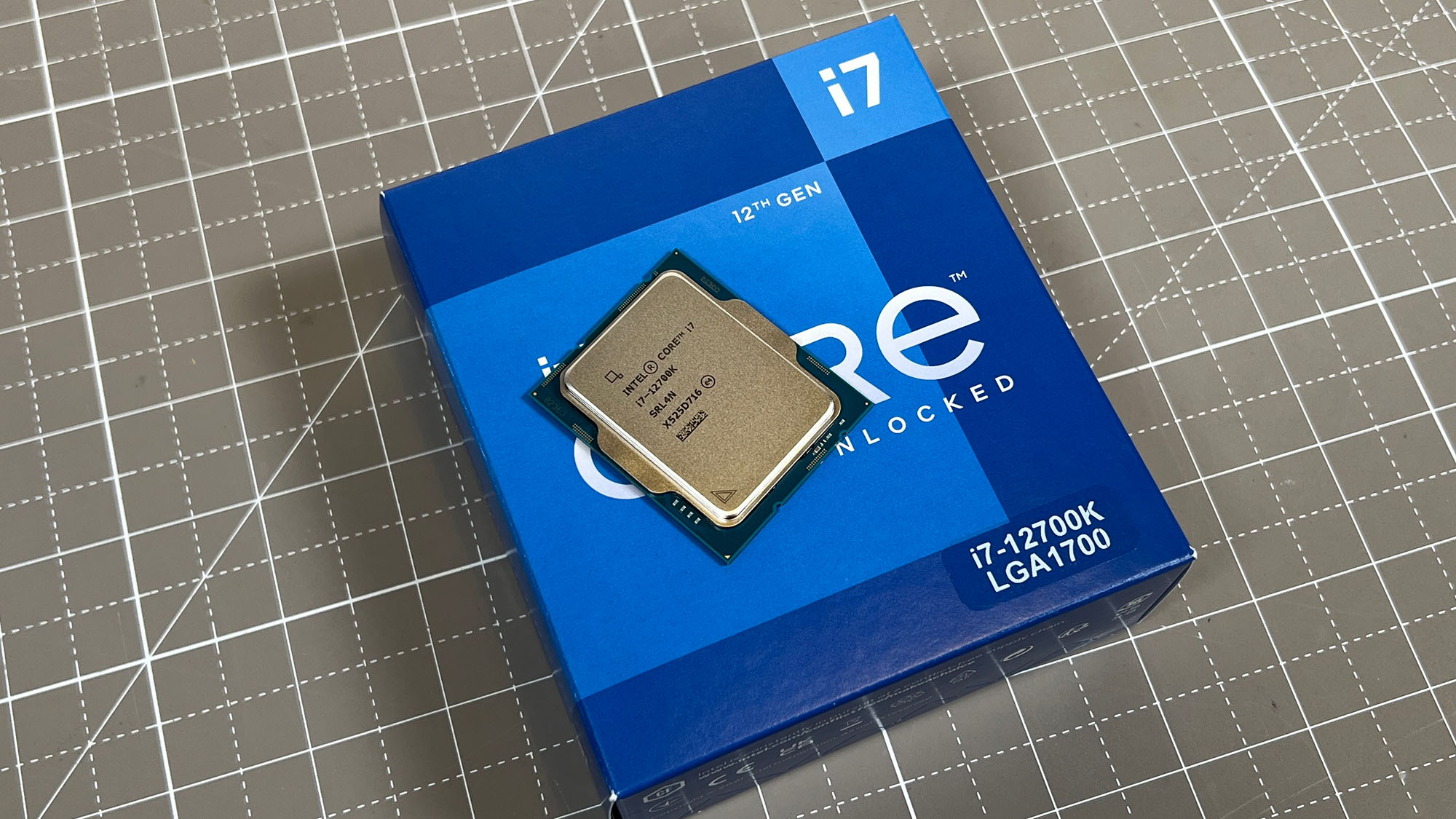 An Intel Core i7-12700K sitting on its retail packaging