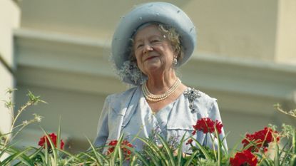 Queen Mother's wardrobe hack revealed. Here she's seen celebrating her 90th birthday in London