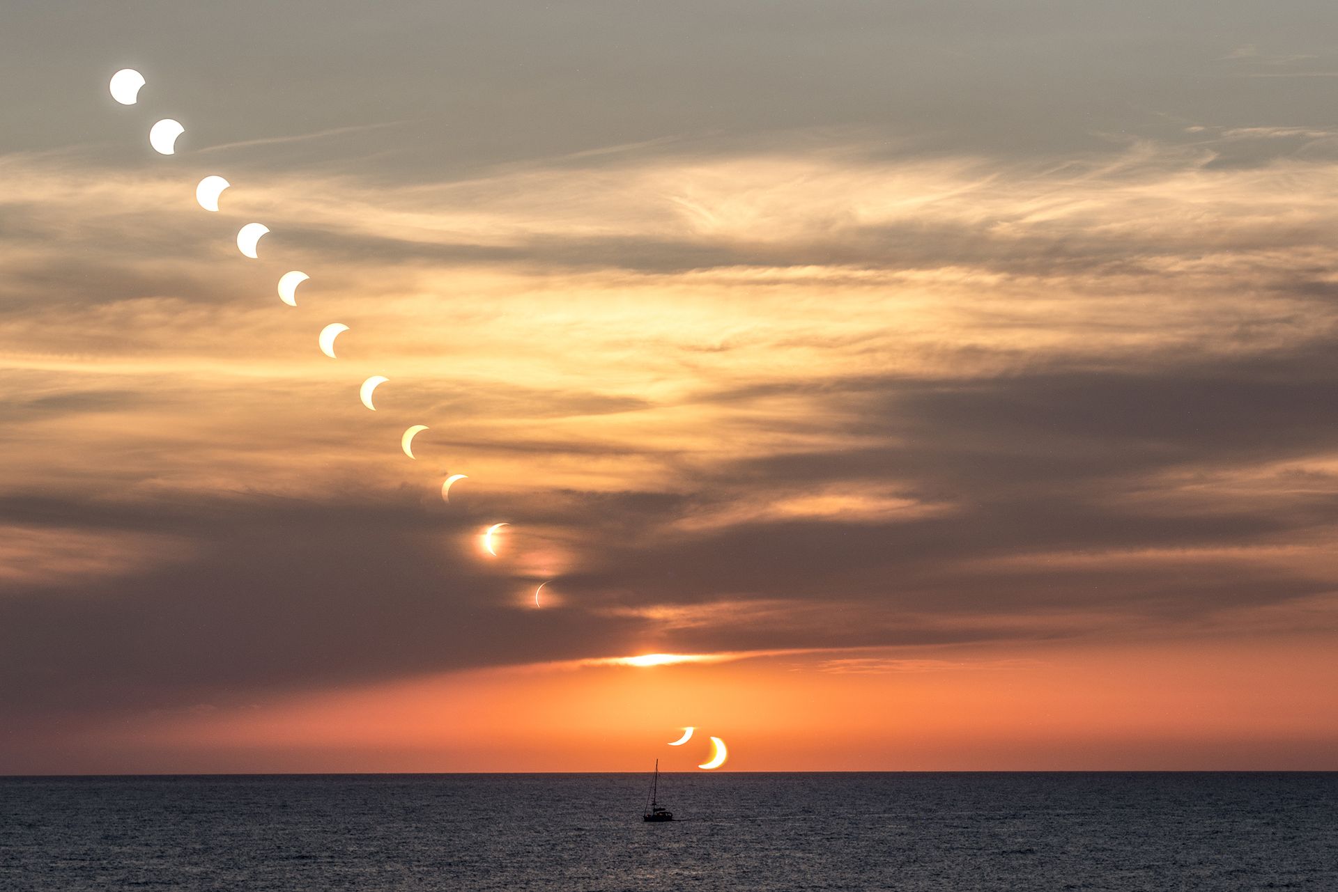 Multiexposure image edited in Photoshop of the view during the total solar eclipse sunset on the Mediterranean Sea of 2026, on August 12, in Port de Soller, Mallorca, Spain