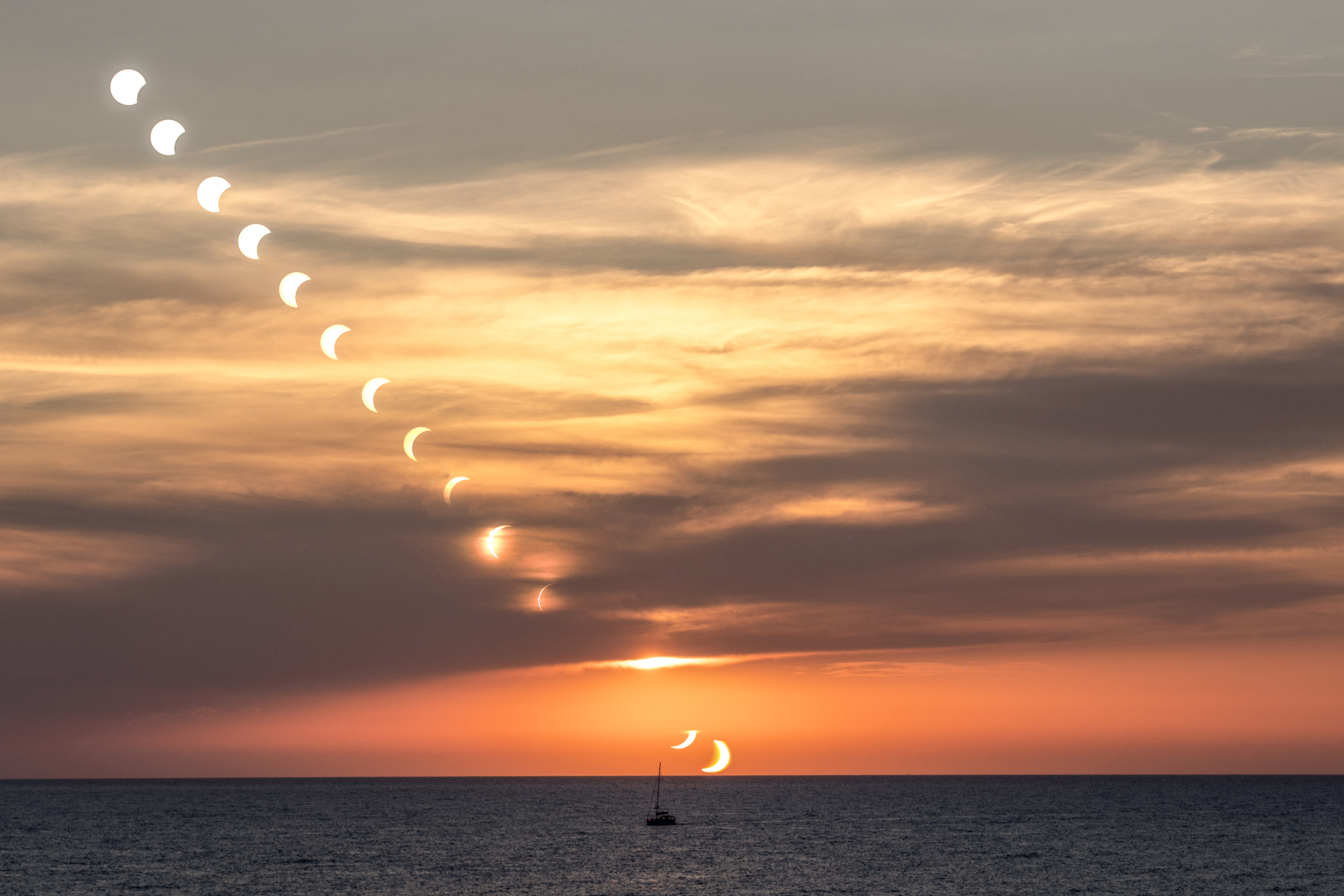 Multiexposure image edited in Photoshop of the view during the total solar eclipse sunset on the Mediterranean Sea of 2026, on August 12, in Port de Soller, Mallorca, Spain