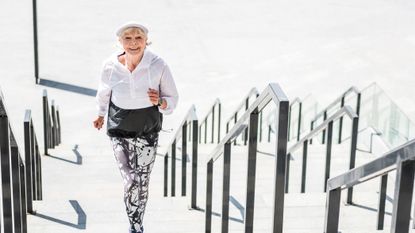 Woman running up stairs doing light-to-moderate activity