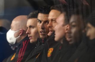 Cristiano Ronaldo, centre, on the substitutes' bench