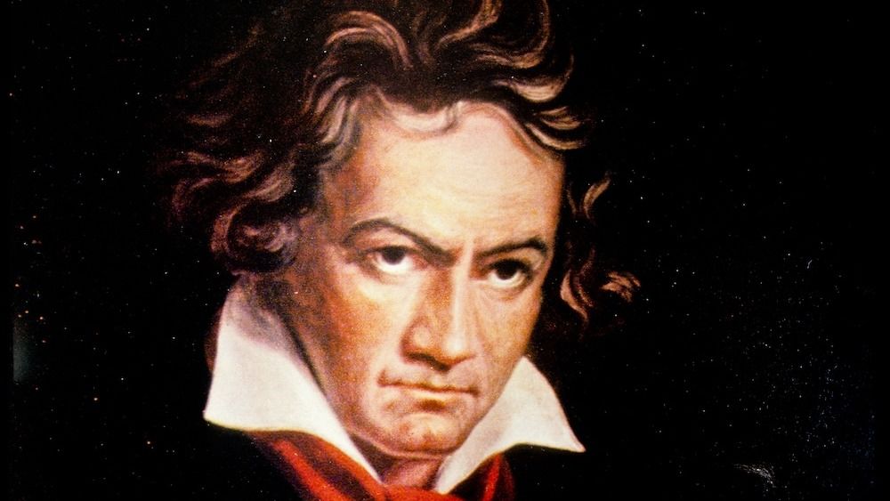 An artist&#039;s illustration of Beethoven in a high white collar and a red scarf against a black background.