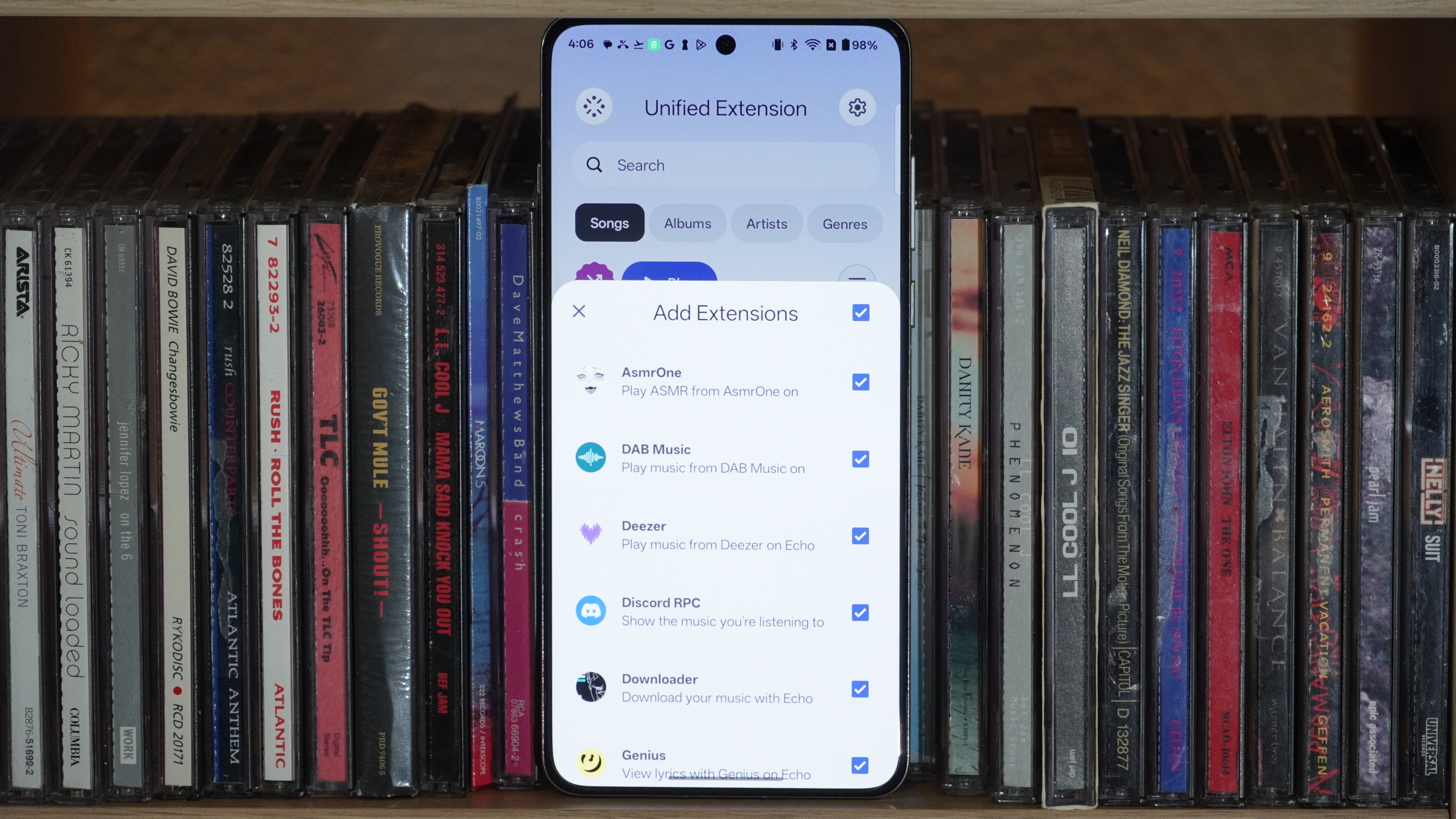 Music player apps running on various Android phones and iPhones.