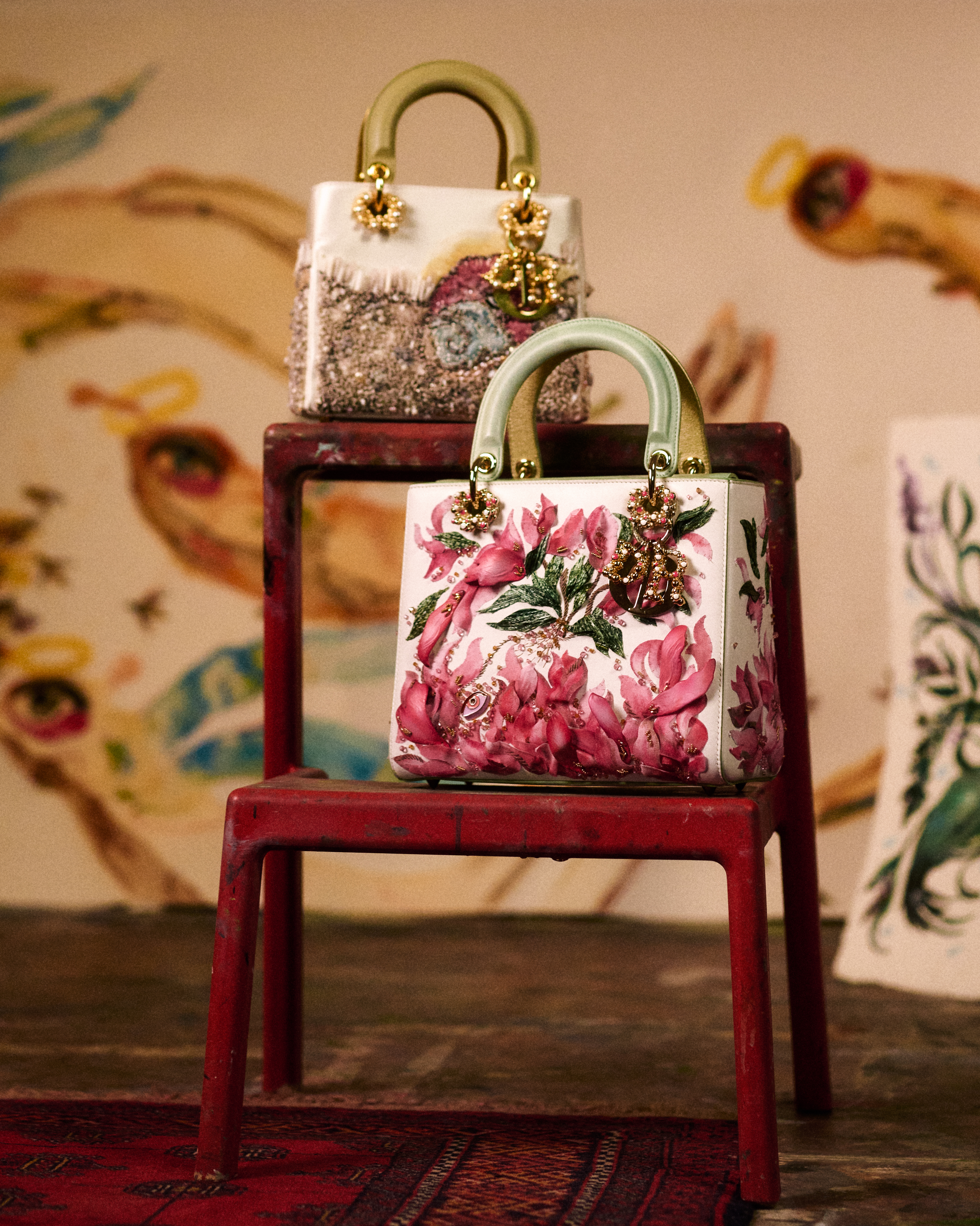 lady dior art bags on a table