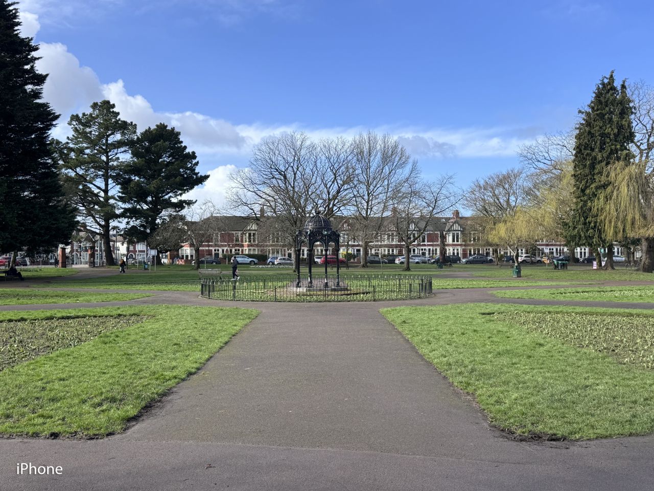 A photo of a park on a sunny day, taken on an iPhone 15 Pro