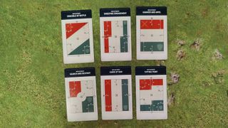 Pariah Nexus Mission Deck deployment cards laid out in a grid on a grassy mat