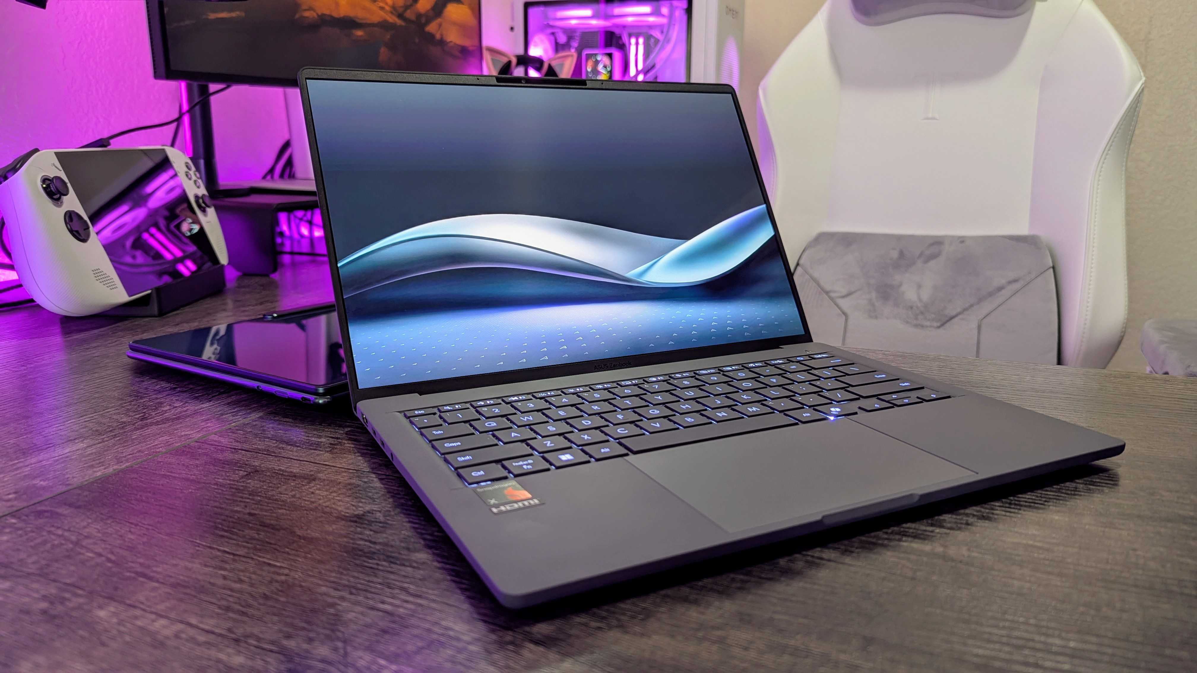 Image of the Lenovo Yoga Slim 9i 14 (Gen 10) and ASUS Zenbook A14 (2025) laptops.