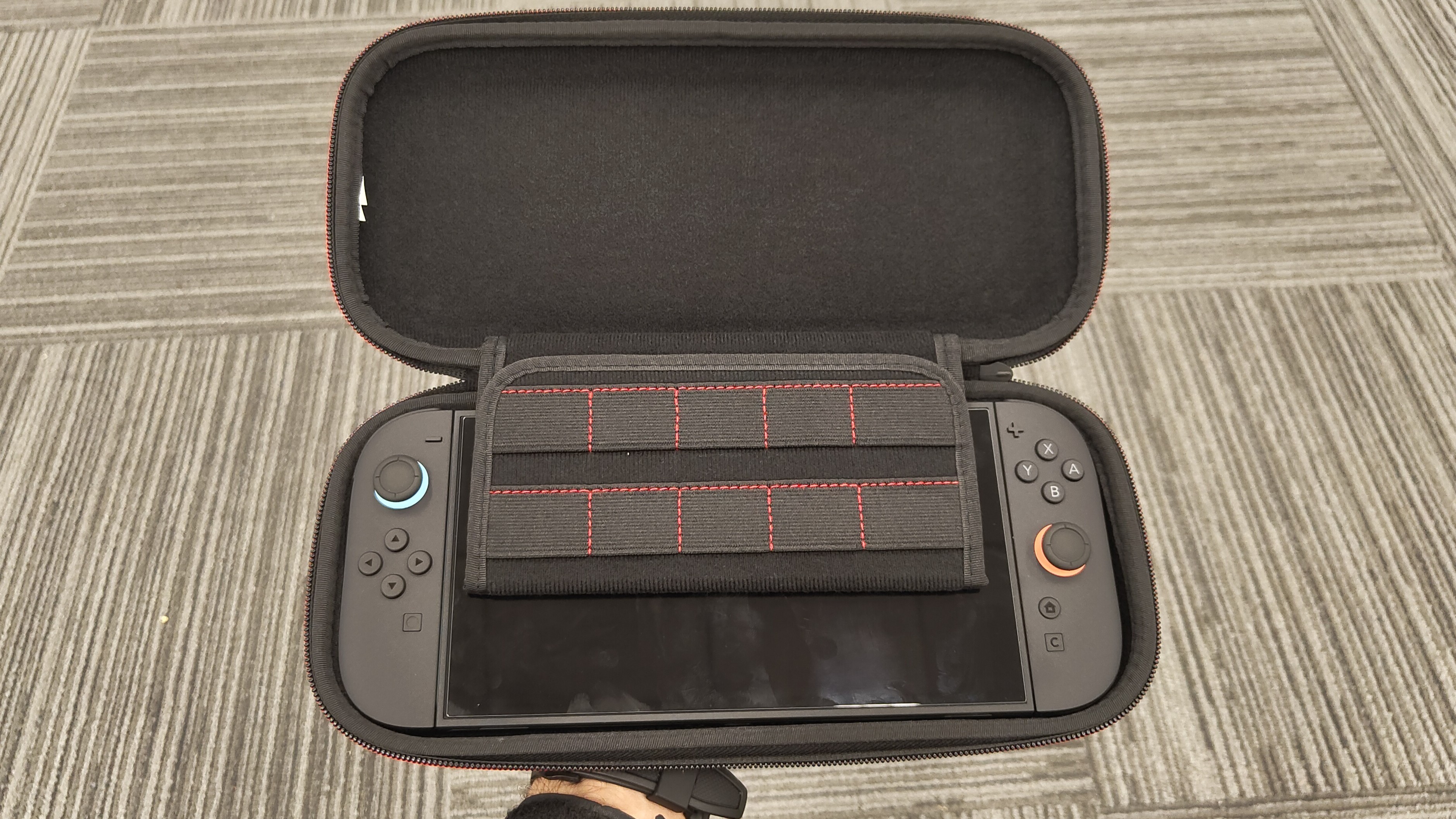 A Nintendo Switch 2 console in a carrying case