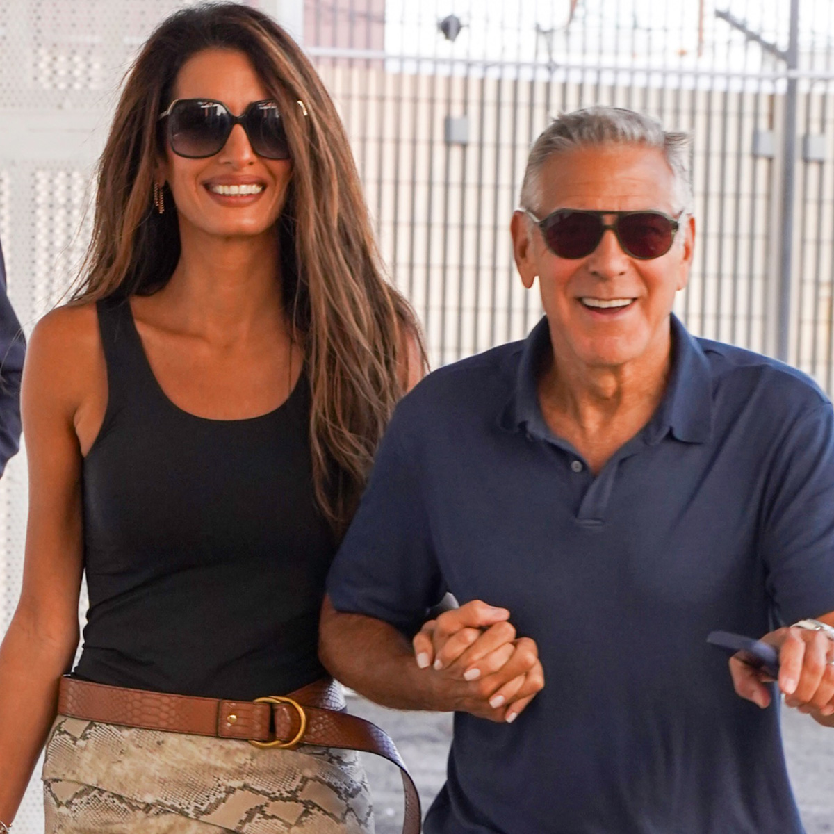 George and Amal Clooney depart Venice in effortless style following the 83rd Venice International Film Festival.