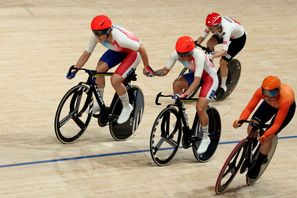 PARIS FRANCE AUGUST 09 LR Marion Borras and Clara Copponi of Team France take over during the Womens Madison Final on day fourteen of the Olympic Games Paris 2024 at SaintQuentinenYvelines Velodrome on August 09 2024 in Paris France Photo by Tim de WaeleGetty Images