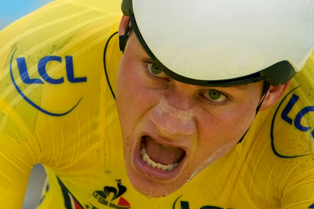 Team Alpecin Fenix Mathieu van der Poel of Netherlands wearing the overall leaders yellow jersey crosses the finish line of the 5th stage of the 108th edition of the Tour de France cycling race a 27 km time trial between Change and Laval on June 30 2021 Photo by Christophe Ena various sources AFP Photo by CHRISTOPHE ENAAFP via Getty Images